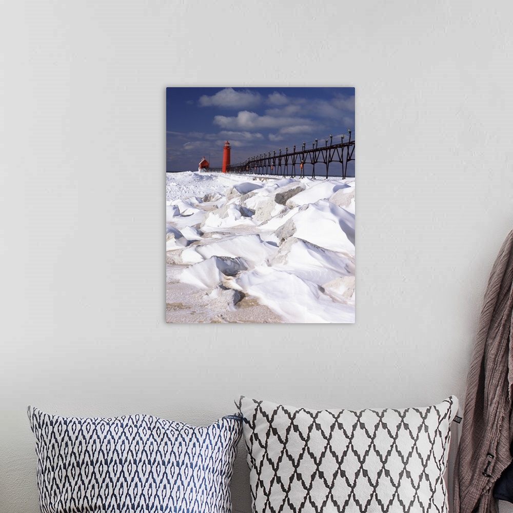 A bohemian room featuring Lighthouse on a snow covered coast, Grand Haven South Pierhead Lighthouse, Grand Haven, Ottawa Co...