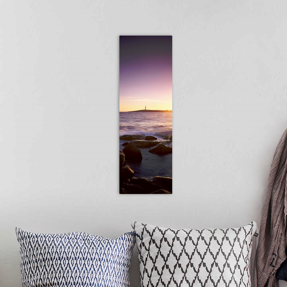A bohemian room featuring Lighthouse on an island at sunset, Cape Leeuwin, Western Australia, Australia