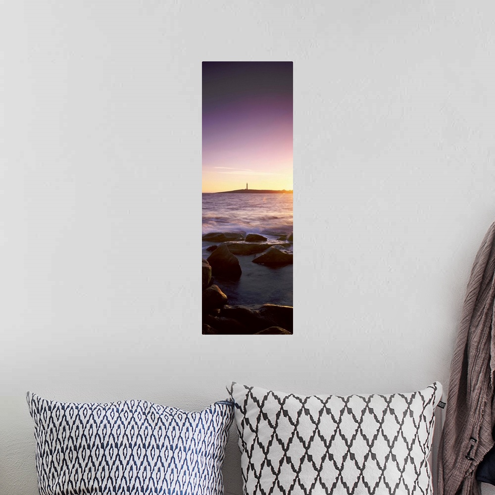 A bohemian room featuring Lighthouse on an island at sunset, Cape Leeuwin, Western Australia, Australia
