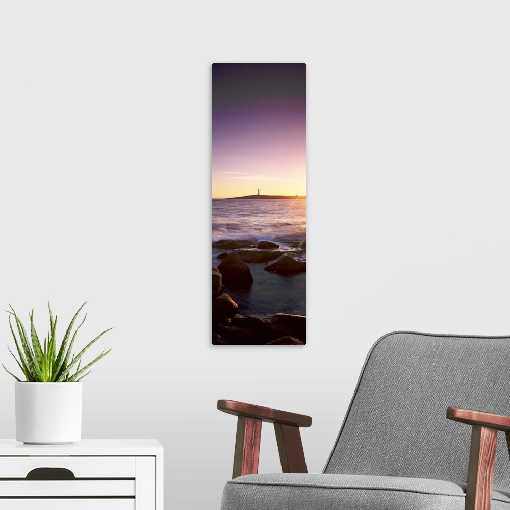 A modern room featuring Lighthouse on an island at sunset, Cape Leeuwin, Western Australia, Australia