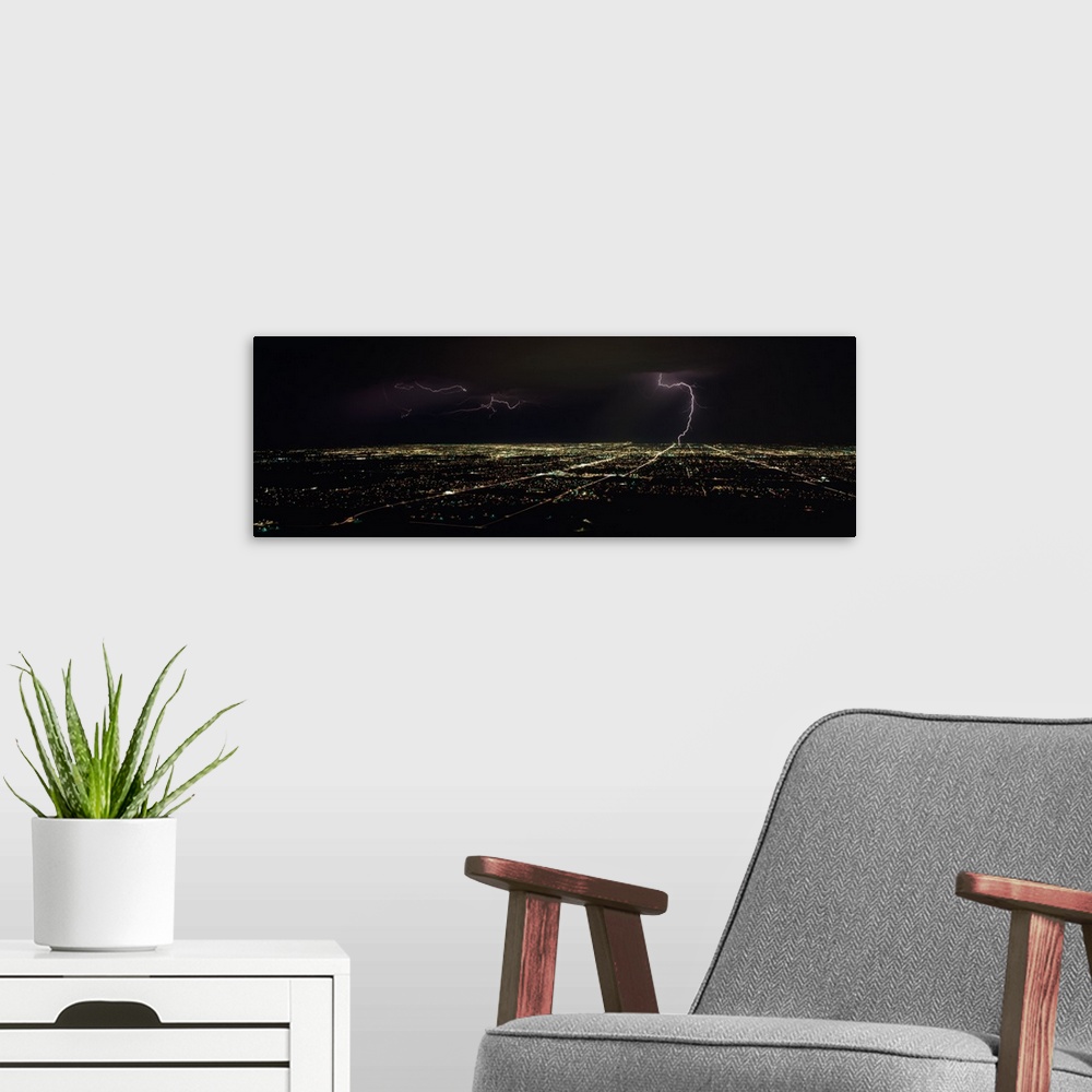 A modern room featuring Lightning in the sky over a city, Phoenix, Maricopa County, Arizona