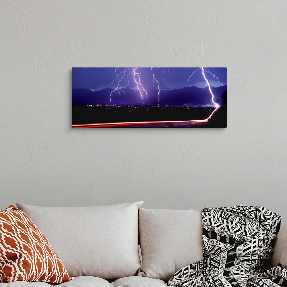 A bohemian room featuring Lightning over a city
