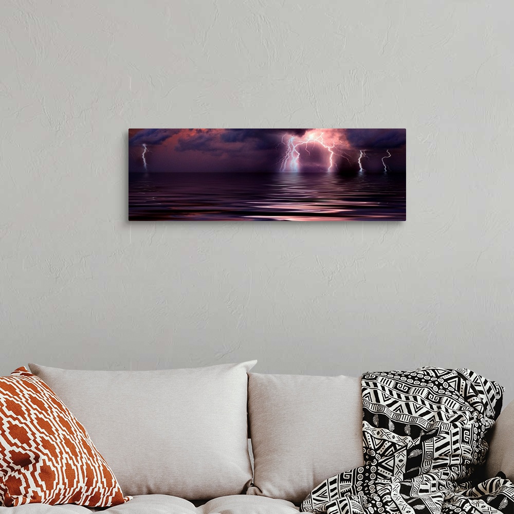 A bohemian room featuring Panoramic wall art of a photograph capturing a storm over the ocean at the moment lightening is s...