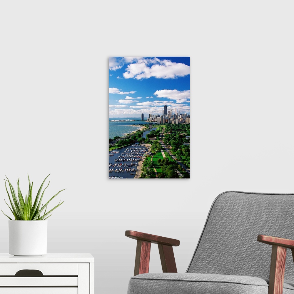 A modern room featuring A vertical cityscape photograph of the urban areas along Lake Michigan.