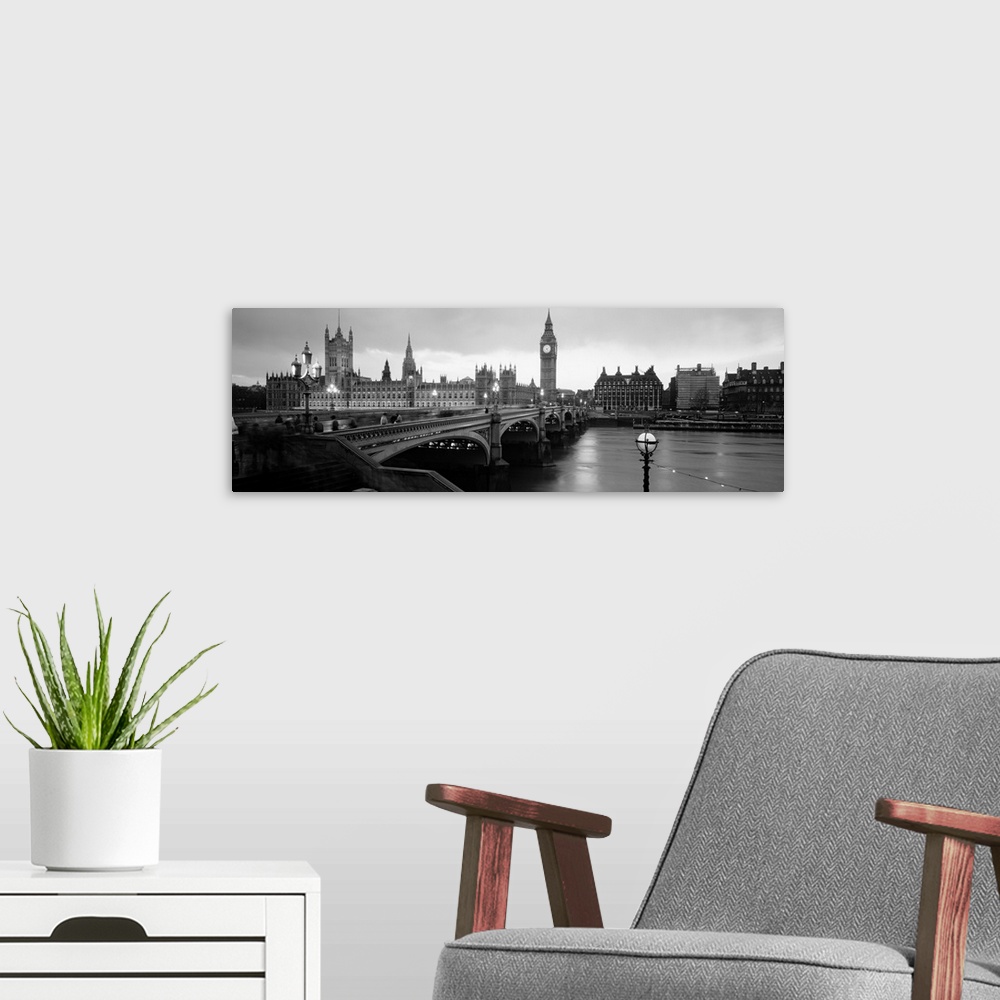 A modern room featuring Panoramic view Westminster Bridge over the River Thames, Big Ben and Westminster Palace in London...