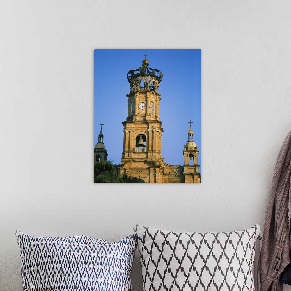A bohemian room featuring Low angle view of a bell tower of a cathedral, Cathedral of Our Lady of Guadalupe, Puerto Vallart...