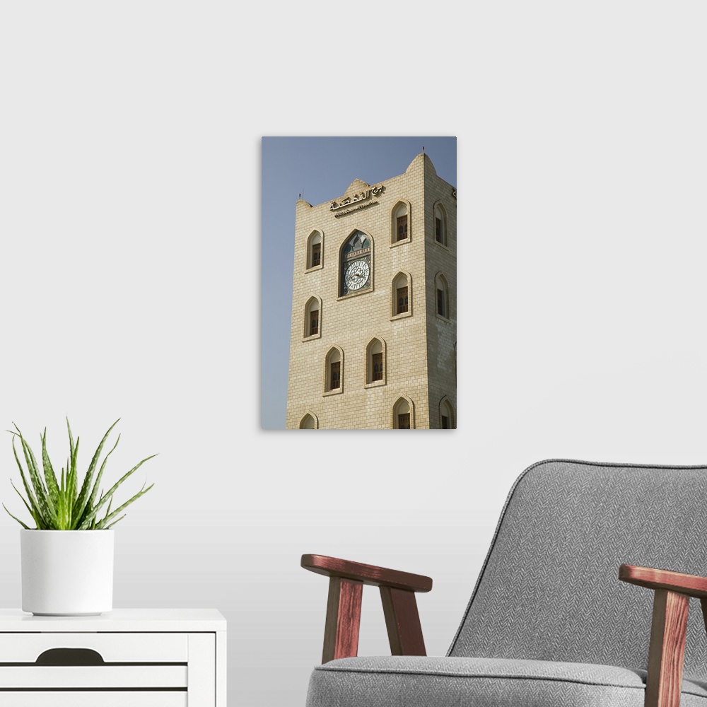 A modern room featuring Low angle view of a Clock tower, Salalah Clock Tower, Salalah, Dhofar, Oman