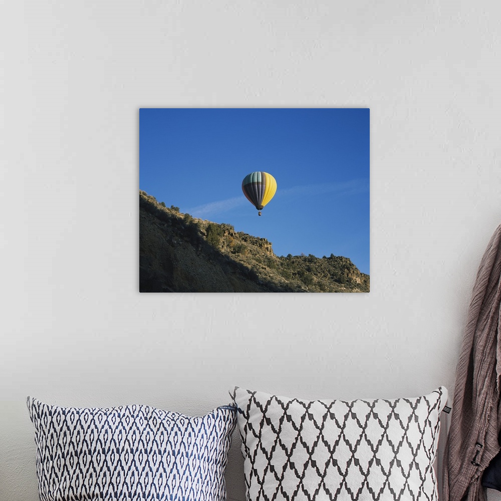 A bohemian room featuring Low angle view of a hot air balloon in the sky, Taos County, New Mexico