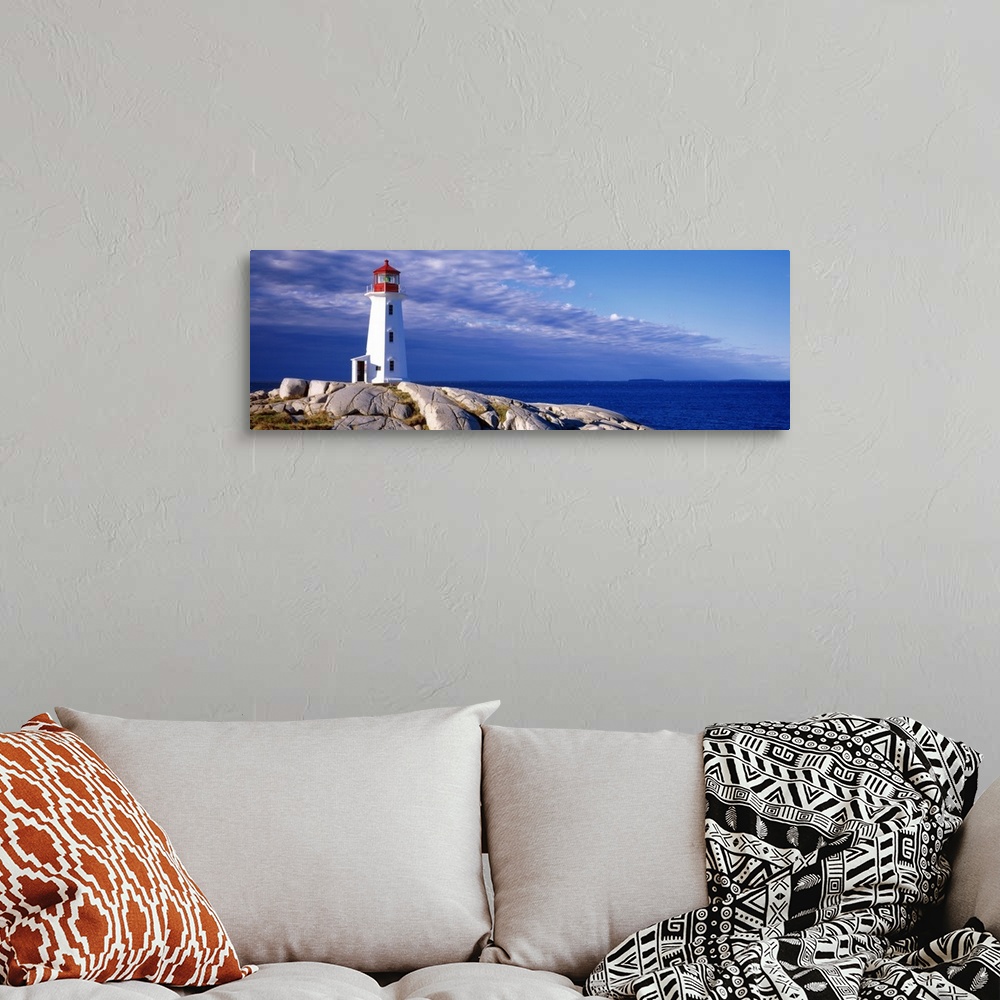A bohemian room featuring Low Angle View Of A Lighthouse, Peggy's Cove, Nova Scotia, Canada
