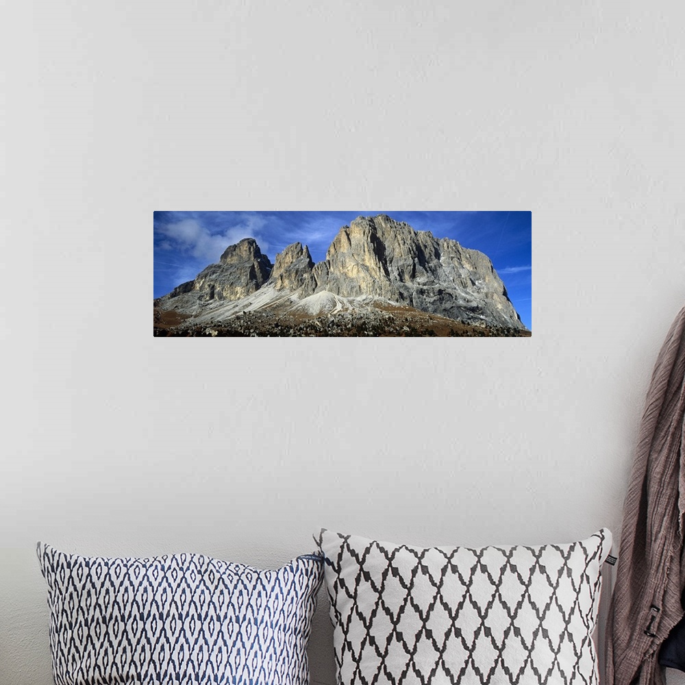A bohemian room featuring Low angle view of a mountain, Passo Sella, Dolomites, Trento, Italy
