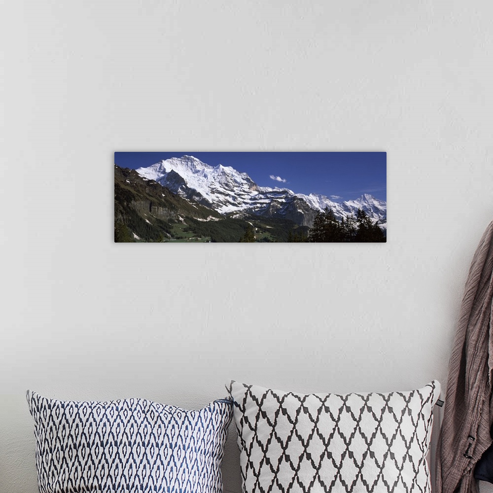 A bohemian room featuring Low angle view of a mountain range Mt Jungfrau Lauterbrunnen Valley Wengen Bernese Oberland Berne...