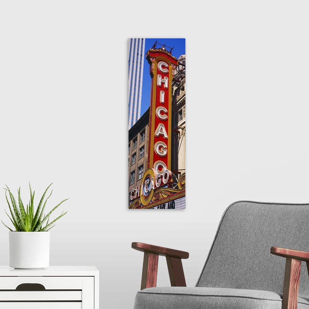 A modern room featuring Large vertical panoramic photograph of a movie theater sign in Chicago, Illinois (IL).