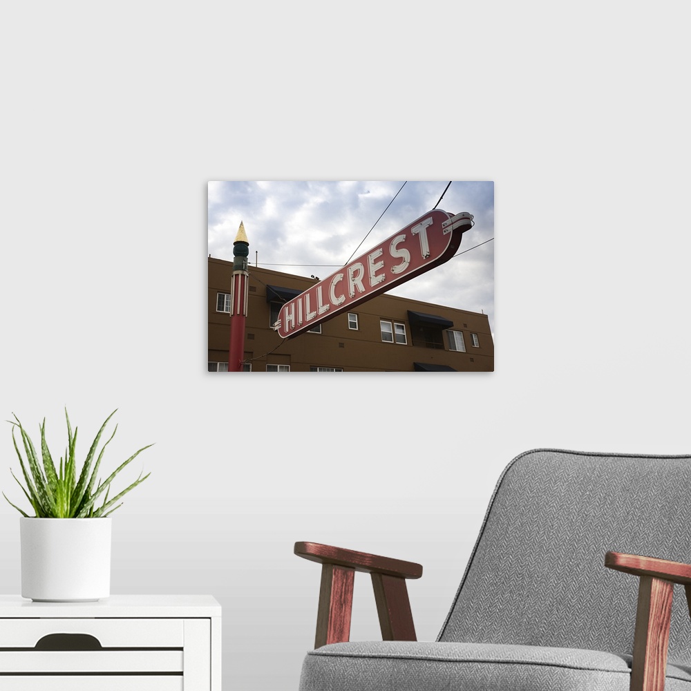 A modern room featuring USA, California, San Diego, signs for Hillcrest, center of San Diego gay community