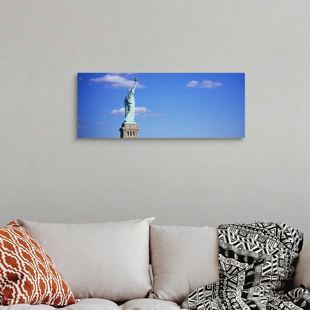 A bohemian room featuring Low angle view of a statue, Statue of Liberty, Liberty State Park, Liberty Island, New York City,...