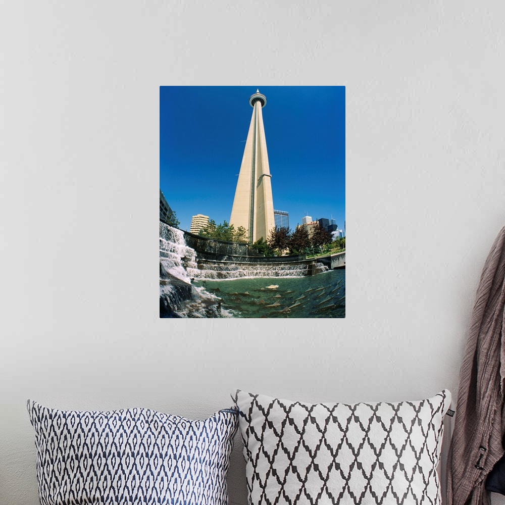 A bohemian room featuring Low angle view of a tower, CN Tower, Salmon Fountain, Toronto, Ontario, Canada