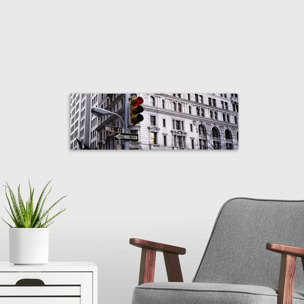 A modern room featuring Low angle view of a traffic light in front of a building, Wall Street, New York City, New York State