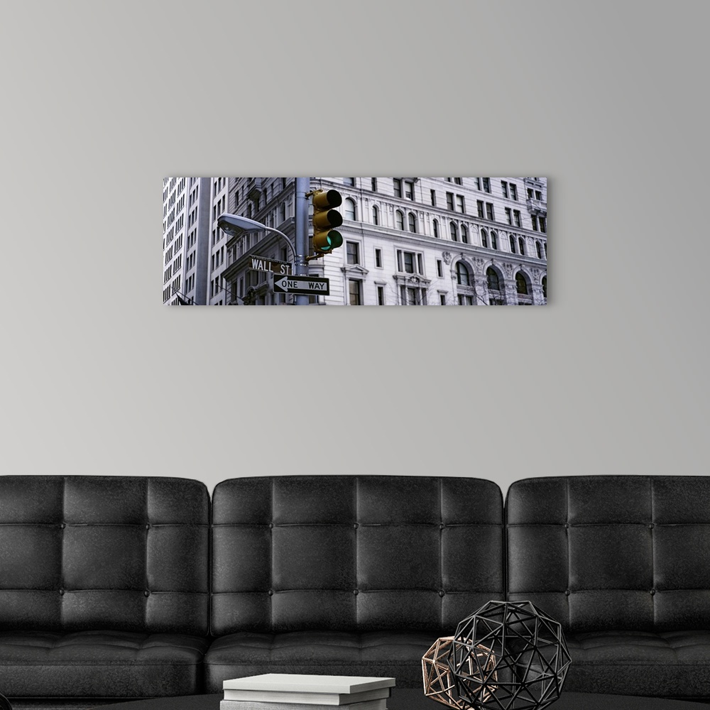A modern room featuring Low angle view of a traffic light in front of a building, Wall Street, New York City, New York State