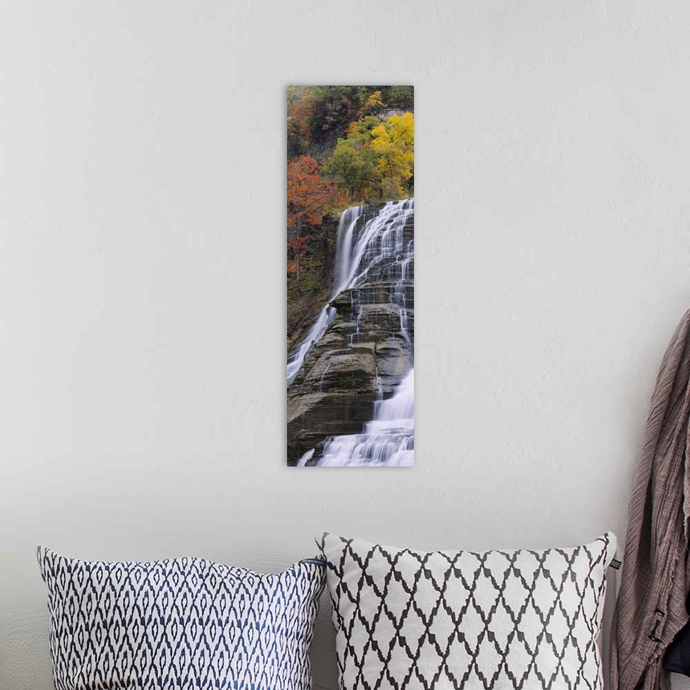 A bohemian room featuring Portrait, low angle photograph on a large canvas of Ithaca Falls in Ithaca, New York.  Brightly c...