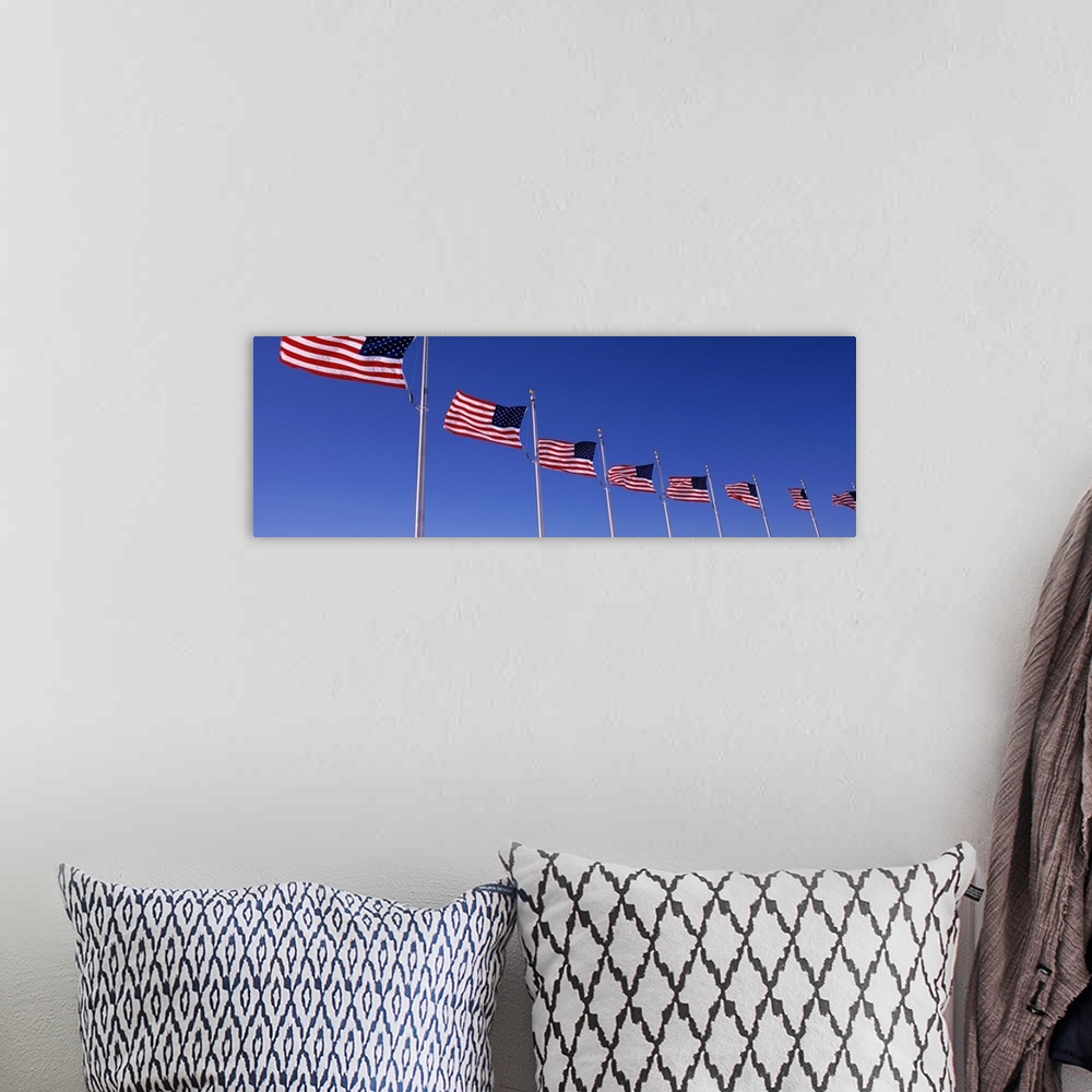 A bohemian room featuring Low angle view of American flags, Washington Monument, Washington DC, USA