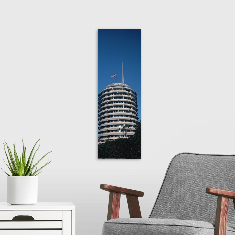 A modern room featuring Low angle view of an office building Capitol Records Building City of Los Angeles California