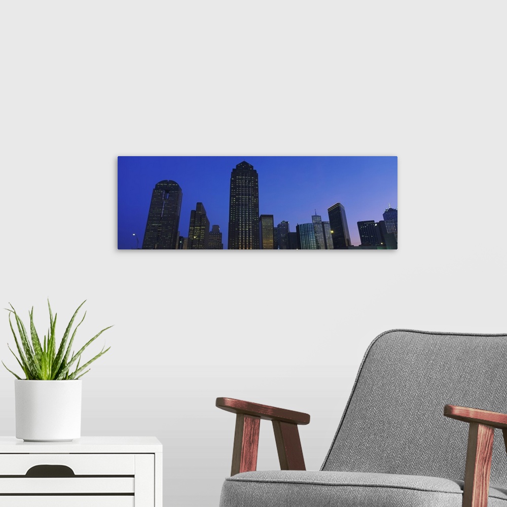 A modern room featuring Low angle view of buildings at dusk, Dallas, Texas
