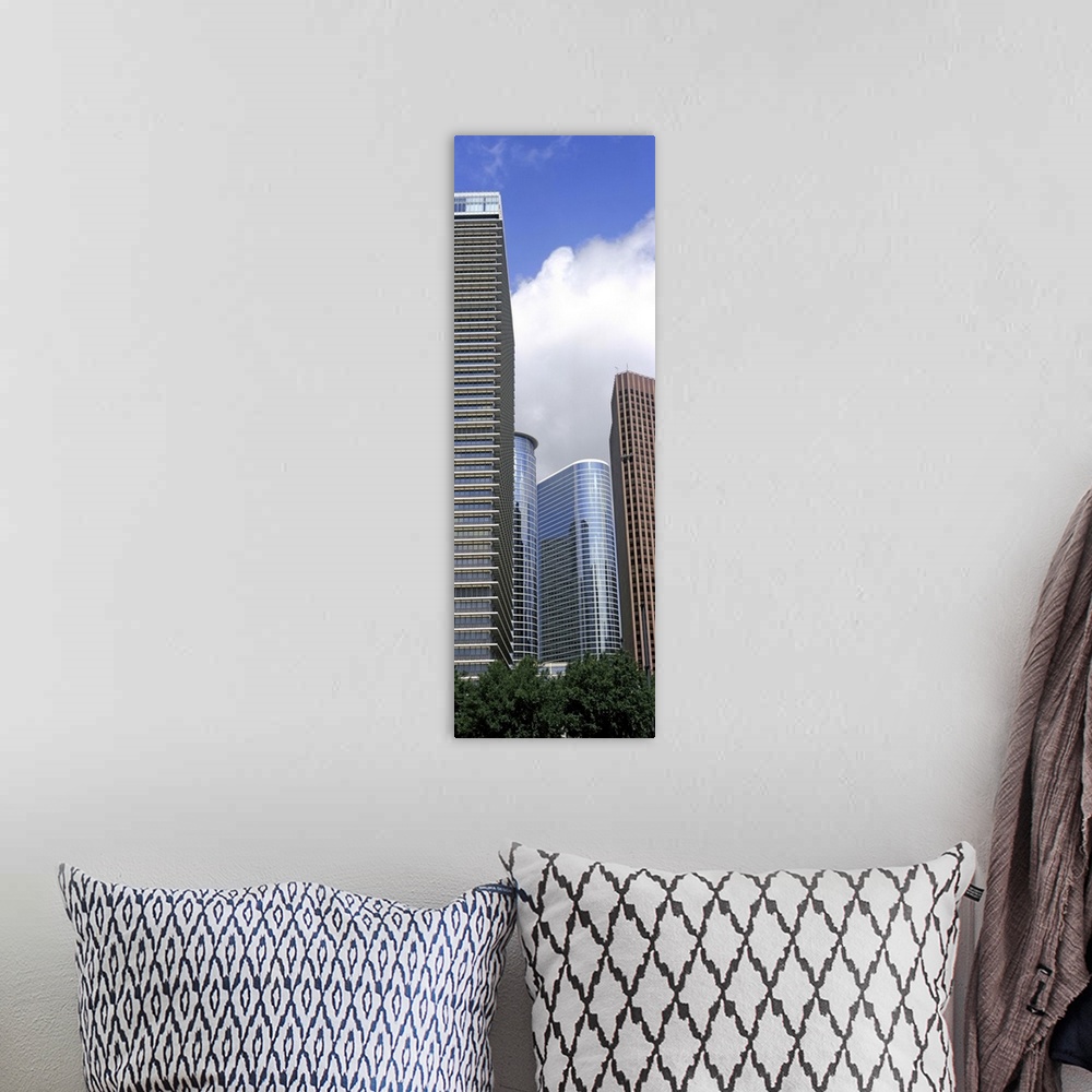 A bohemian room featuring Low angle view of buildings in a city, Wedge Tower, Chevron Building, Houston, Texas