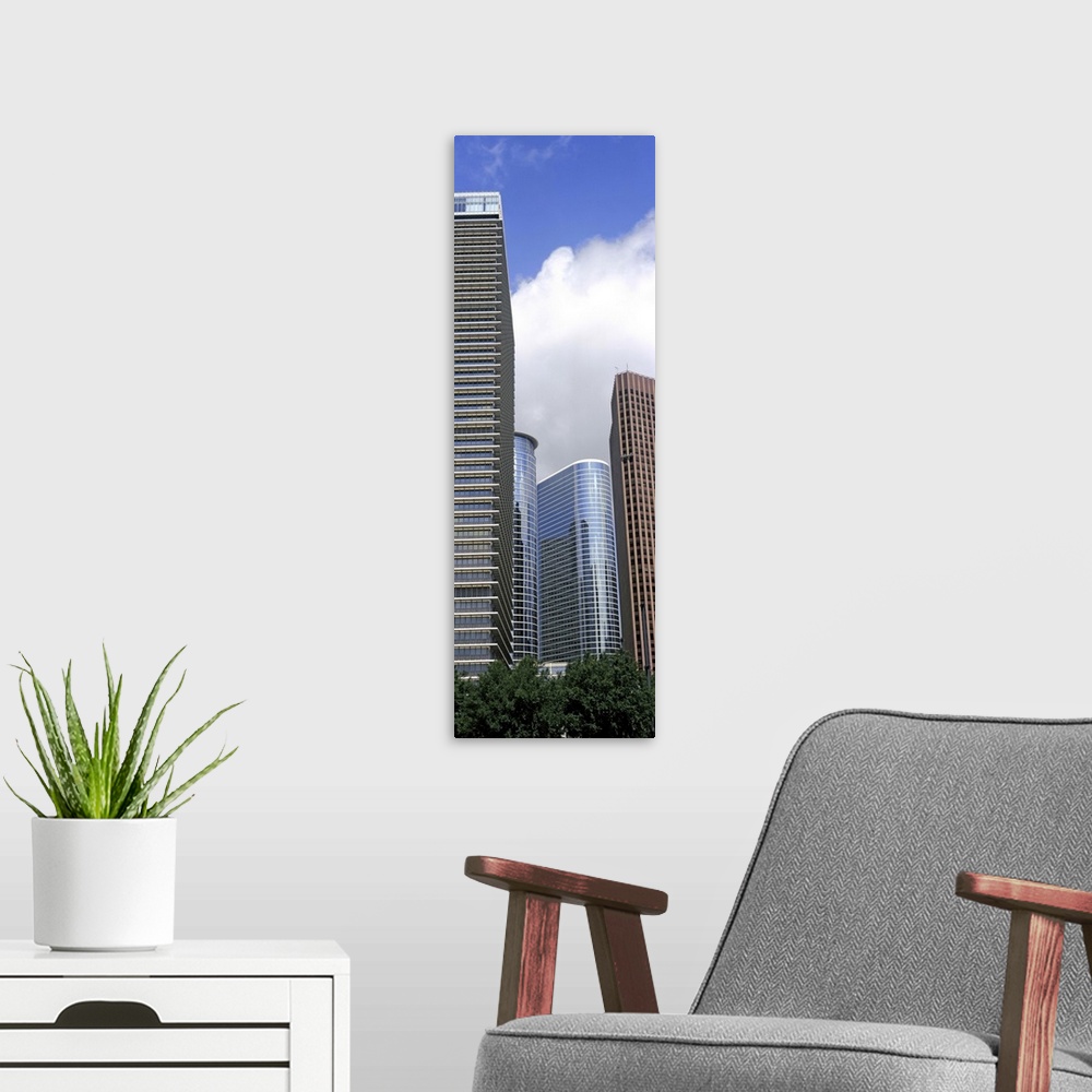 A modern room featuring Low angle view of buildings in a city, Wedge Tower, Chevron Building, Houston, Texas