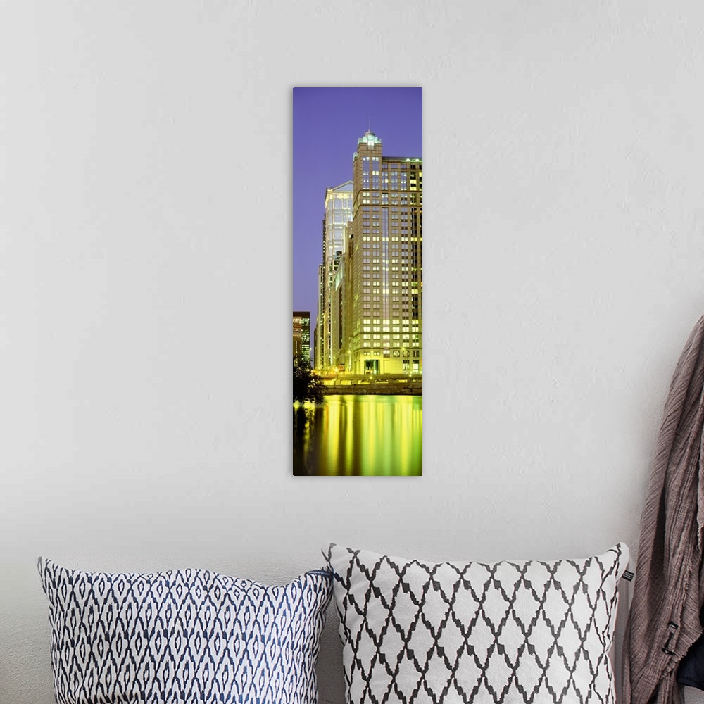 A bohemian room featuring Low angle view of buildings lit up at night at the waterfront, Chicago River, Chicago, Illinois