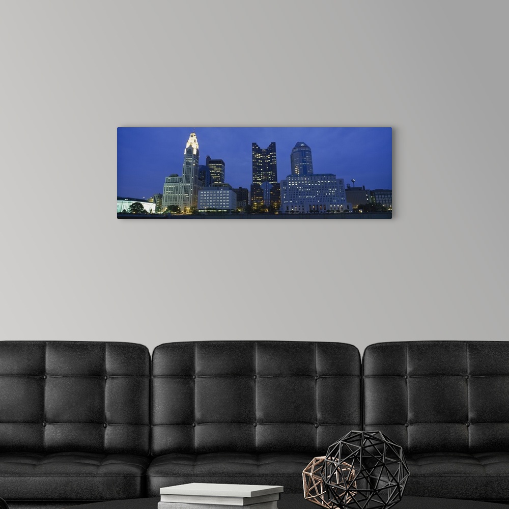 A modern room featuring Low angle view of buildings lit up at night, Columbus, Ohio