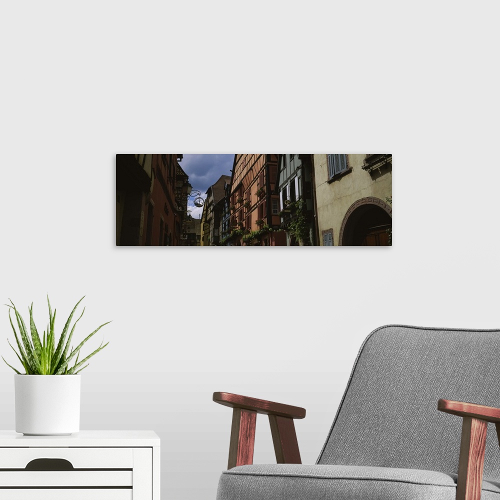 A modern room featuring Low angle view of buildings, Route Du Vin, Riquewihr, Alsace, France