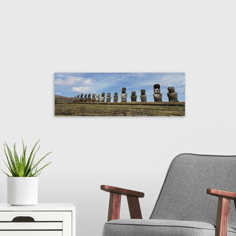 A modern room featuring Low angle view of Moai statues in a row, Tahai Archaeological Site, Rano Raraku, Easter Island, C...