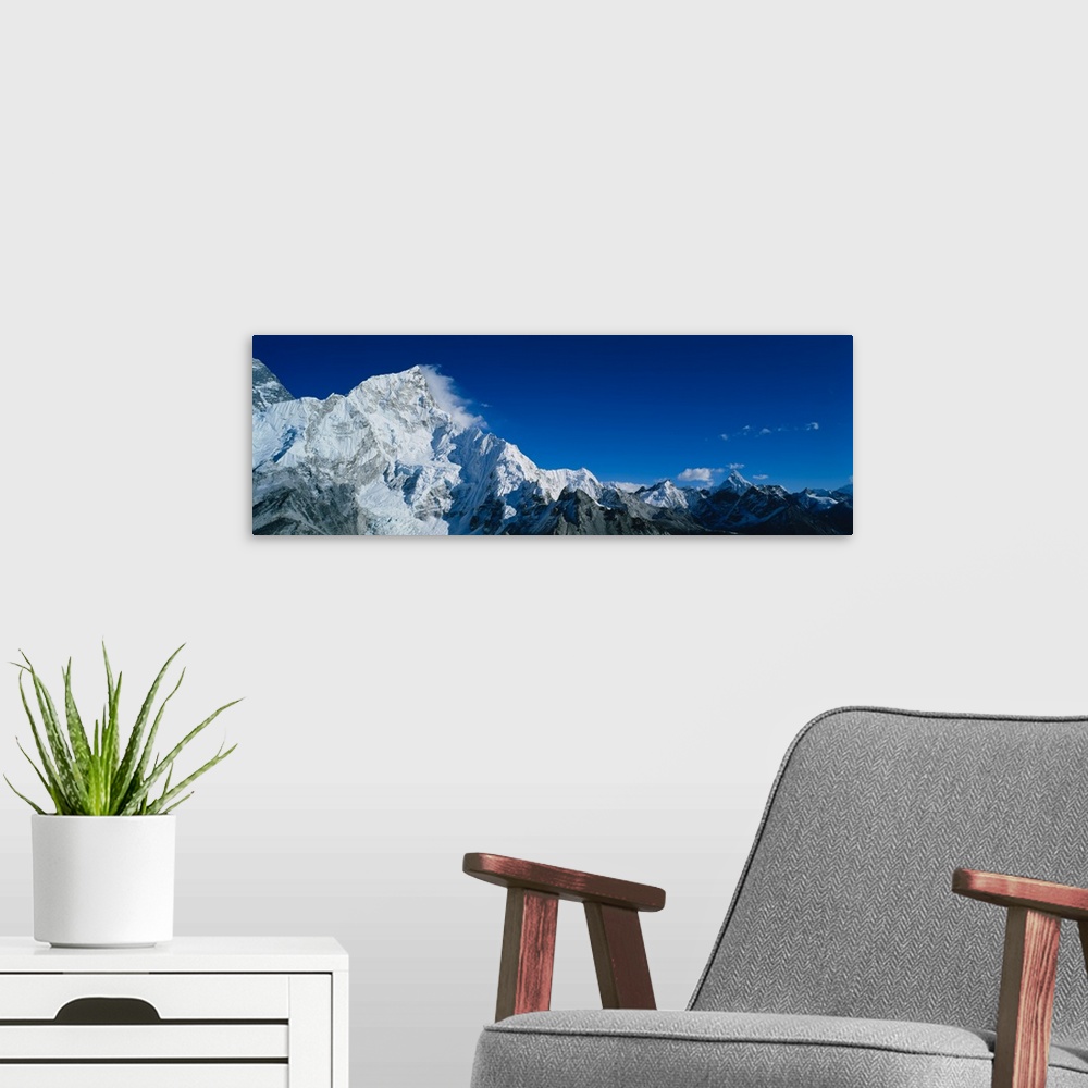 A modern room featuring Low angle view of mountains covered with snow, Himalaya Mountains, Khumba Region, Nepal