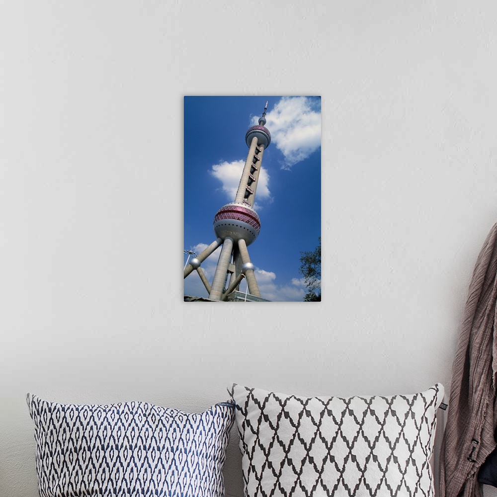 A bohemian room featuring Low angle view of Oriental Pearl TV tower, blue sky, Shanghai, China.