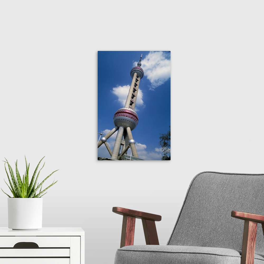 A modern room featuring Low angle view of Oriental Pearl TV tower, blue sky, Shanghai, China.
