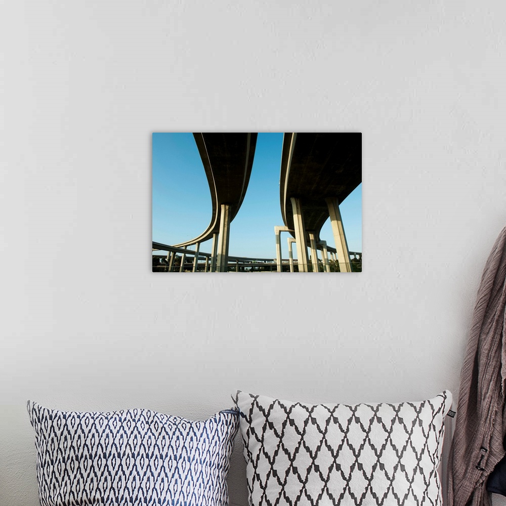A bohemian room featuring Low angle view of overpasses, Interstate 105, Los Angeles, California II