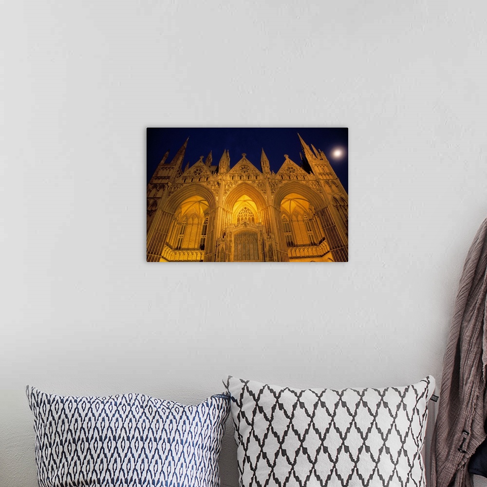 A bohemian room featuring Low-angle view of Peterborough Cathedral illuminated at night, Peterborough, England.