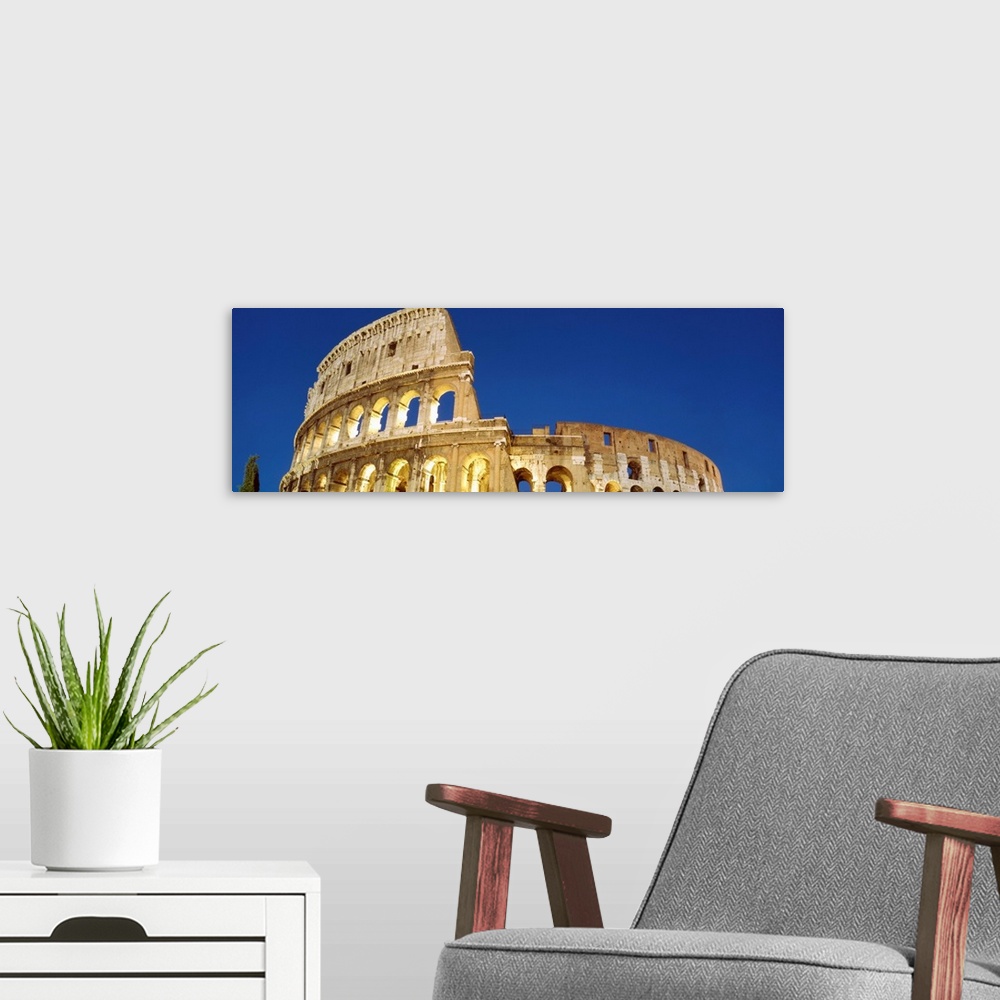 A modern room featuring Low angle view of ruins of an amphitheater, Coliseum, Rome, Lazio, Italy