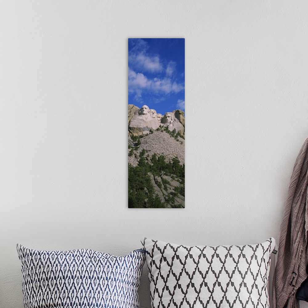 A bohemian room featuring Low angle view of sculptures of US presidents carved on the rocks of a mountain, Mt Rushmore Nati...