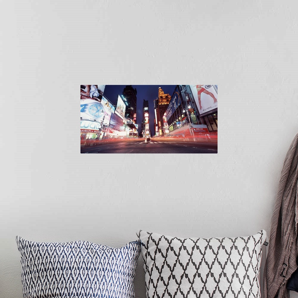 A bohemian room featuring Low-angle panorama of the lights of Times Square in downtown New York City.