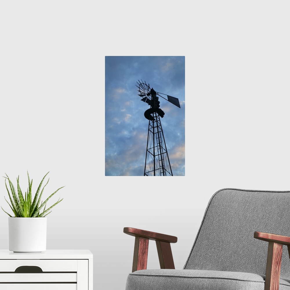 A modern room featuring Low angle view of silhouetted windmill, cloudy sky, Iowa