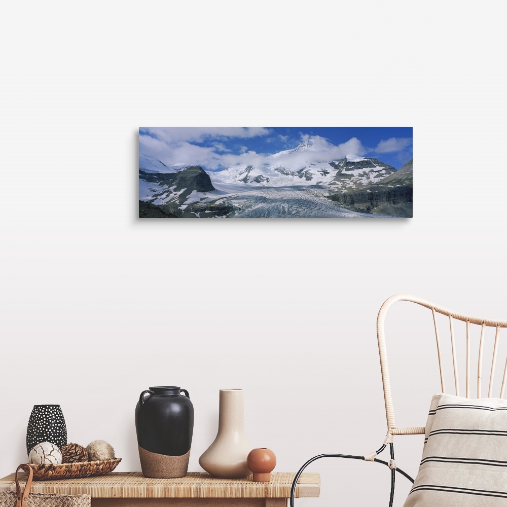 A farmhouse room featuring Low angle view of snowcapped mountains, Mt Robson, Mount Robson Provincial Park, British Columbia...
