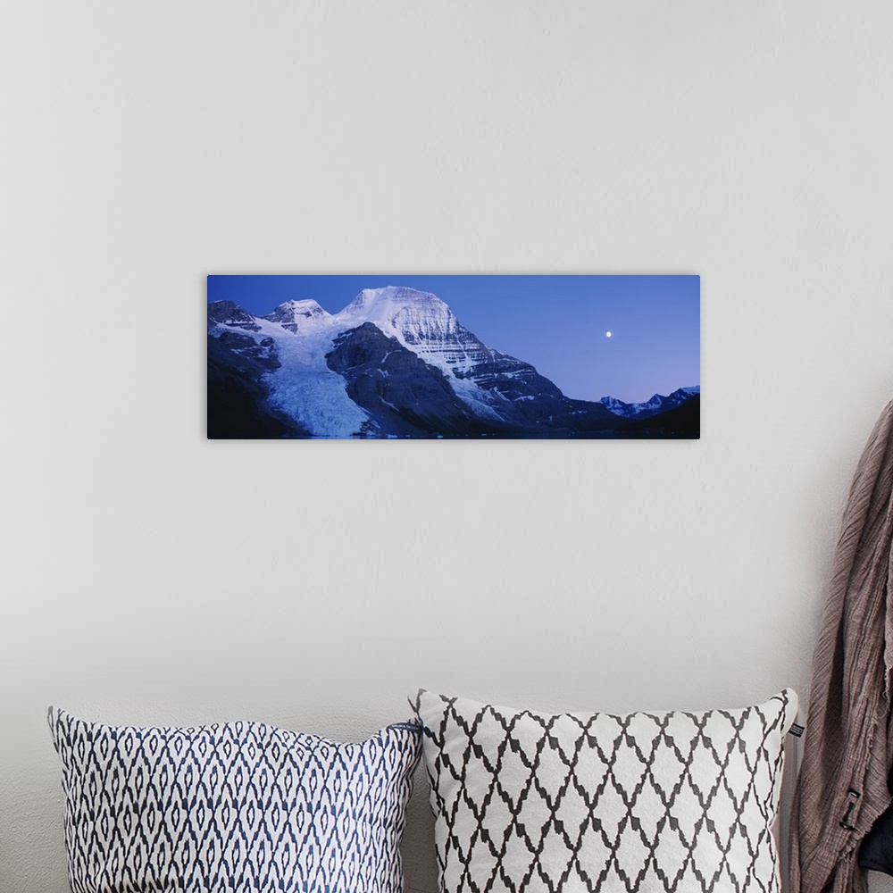 A bohemian room featuring Low angle view of snowcapped mountains, Mt Robson, Mount Robson Provincial Park, British Columbia...