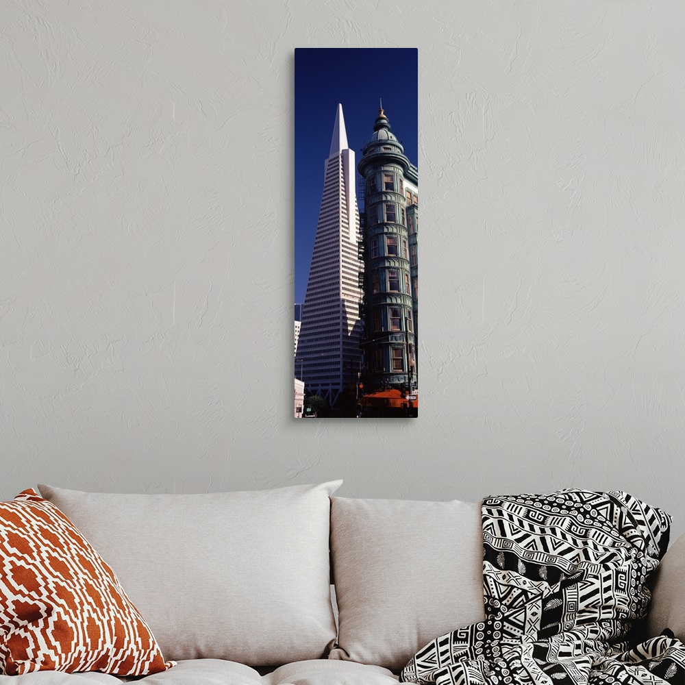 A bohemian room featuring Low angle view of towers, Columbus Tower, Transamerica Pyramid, San Francisco, California,
