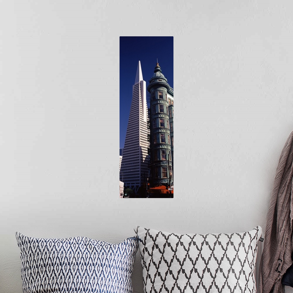 A bohemian room featuring Low angle view of towers, Columbus Tower, Transamerica Pyramid, San Francisco, California,