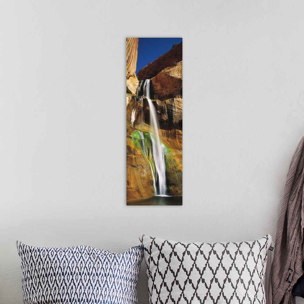 A bohemian room featuring A vertical photograph taken with the time lapsed technique show the flow of the water down the ro...