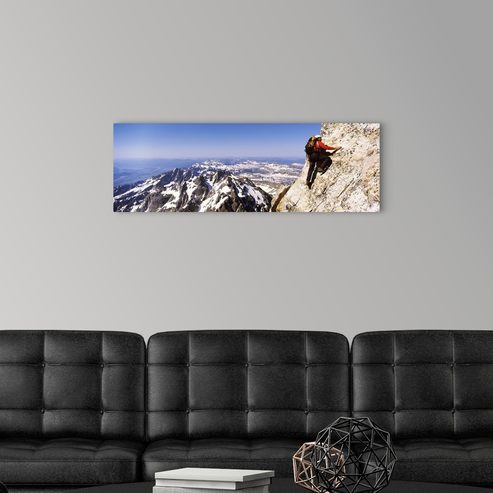 A modern room featuring Man climbing up a mountain, Grand Teton National Park, Wyoming