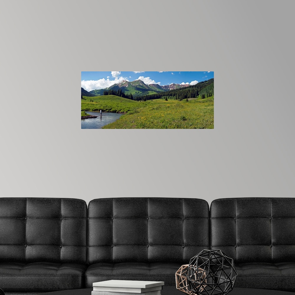 A modern room featuring Man fly-fishing in Slate River, Crested Butte, Gunnison County, Colorado