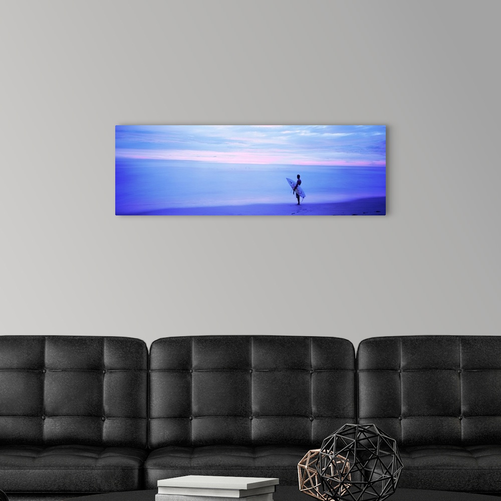 A modern room featuring Man With Surfboard on Beach Costa Rica