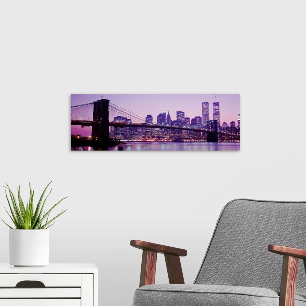 A modern room featuring Landscape, oversized panoramic of the New York City skyline with the twin towers, and the Brookly...