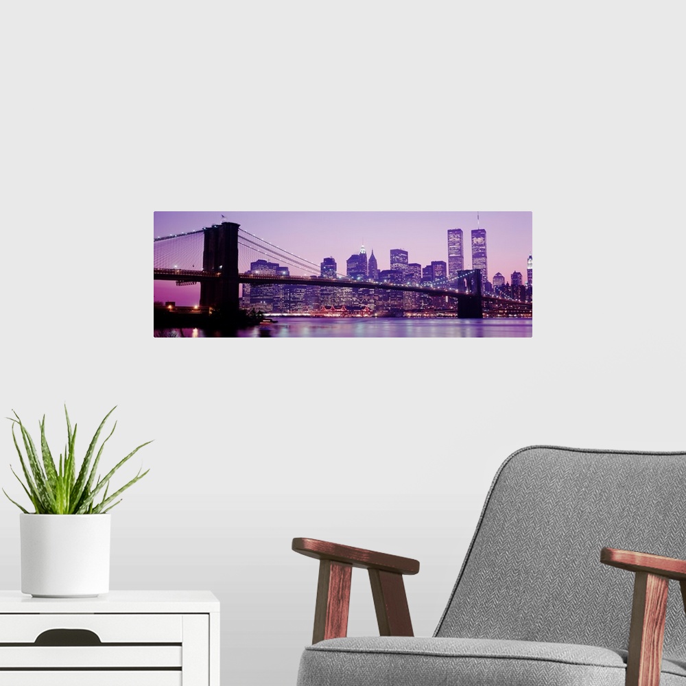 A modern room featuring Landscape, oversized panoramic of the New York City skyline with the twin towers, and the Brookly...